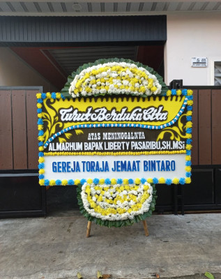 Papan Bunga Duka di Pemurus Luar